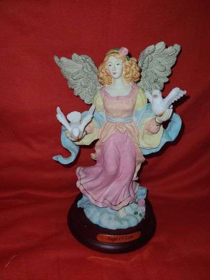 4 angel figures