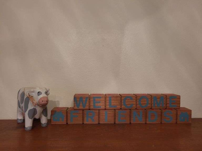 Wooden Cow & welcome block sign