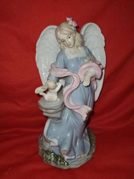 4 angel figures