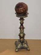 Ornate candle holders with ornate balls