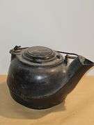 Vintage cast iron tea kettle