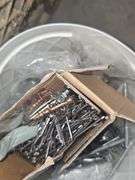 Gray crate of office supplies & misc items orange crate of house repair items
