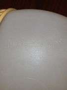 Is Tupperware cake PAN with handle and Tupperware vegetable server.