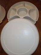 Is Tupperware cake PAN with handle and Tupperware vegetable server.