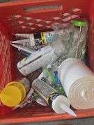 Gray crate of office supplies & misc items orange crate of house repair items