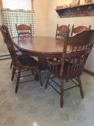 Solid wood dining table, 4 chairs, & 2 captain chairs