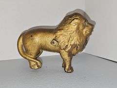 Heavy metal lion figure