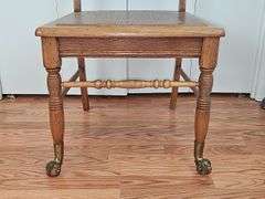 Wooden Chair with Antique Claw Legs.