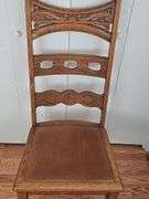 Wooden Chair with Antique Claw Legs.
