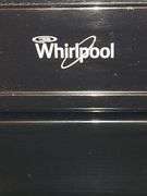 Whirlpool glass top stove.