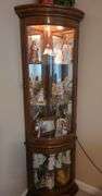 Lighted corner curio cabinet