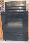 Whirlpool glass top stove.