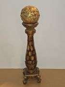 Ornate candle holders with ornate balls