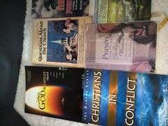 Small wooden Cross, Religious VHS tapes, inspirational books, Wall Plaques & more
