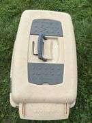Tan and red dog carrier