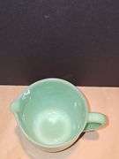Vintage Fire King Jadeite milk pitcher.