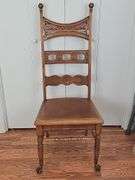 Wooden Chair with Antique Claw Legs.