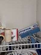 Shelf contents and cleaning supplies