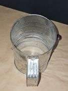 Vintage sifter and measuring cups