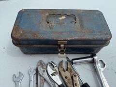 Small vintage metal toolbox and contents.