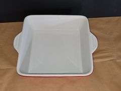 Red and white casserole dish.