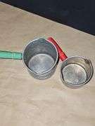 Vintage sifter and measuring cups