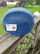 Blue plastic watering can