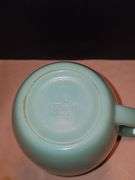 Vintage Fire King Jadeite milk pitcher.