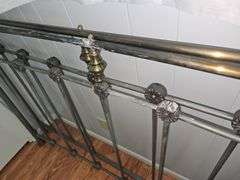 Metal Bed with Flower Detail