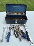 Small vintage metal toolbox and contents.