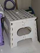 Shelf contents and cleaning supplies