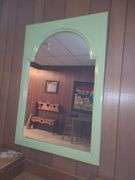 Mirror with green frame