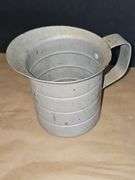Vintage sifter and measuring cups
