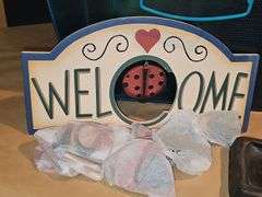 Trays (plastic), candle holders & more.