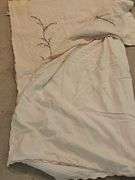 Cloth shower curtain, clothes hamper, & more.