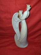 3 Angel figurines.