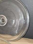 Pyrex bowls with lids & oval bowl with lid in basket