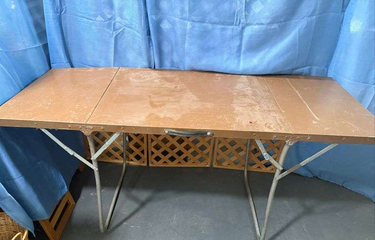 Brown metal folding table