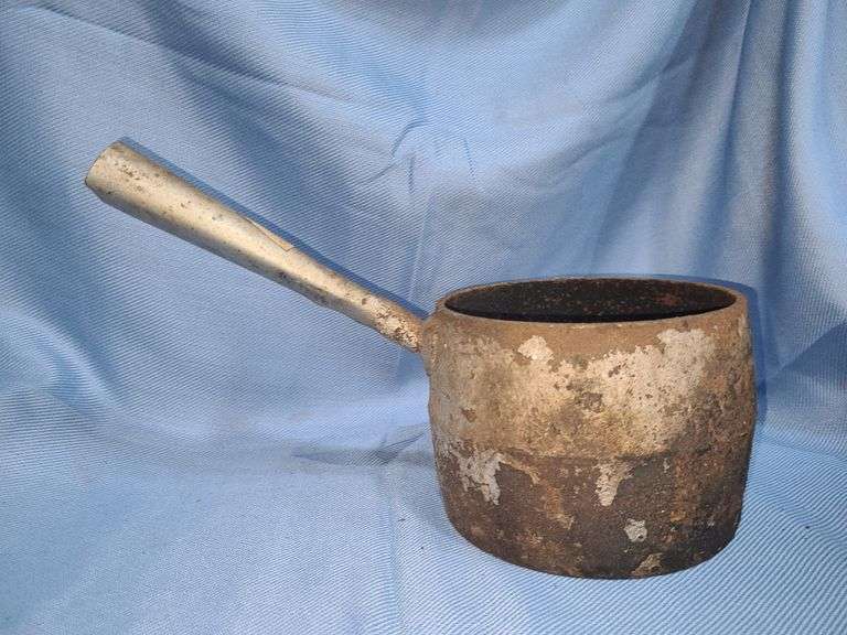Antique cast iron pot or melting pot