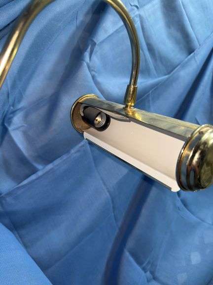 Gold colored desk lamp