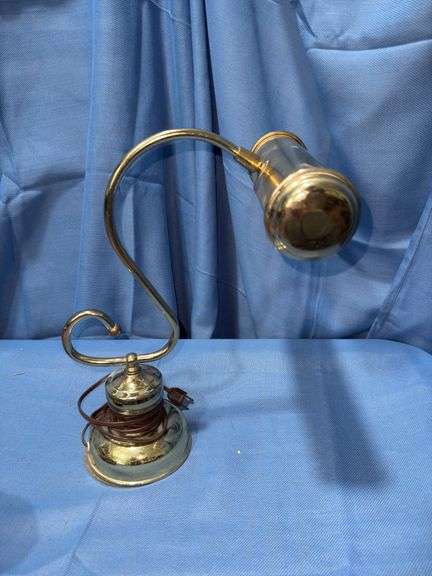 Gold colored desk lamp