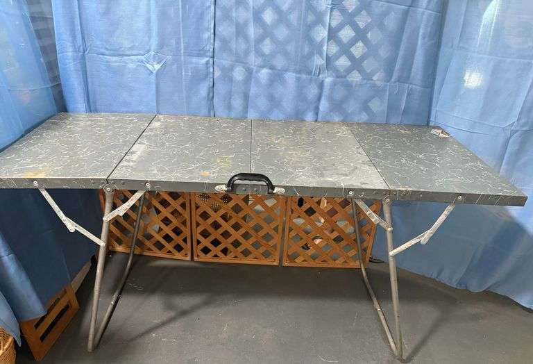 Gray metal folding table