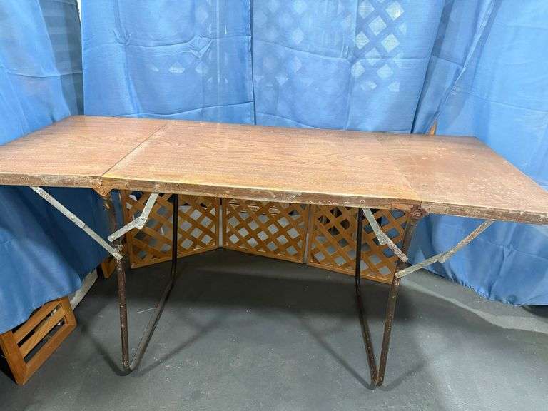 Vintage brown woodgrain style metal folding table