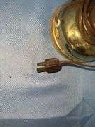 Gold colored desk lamp