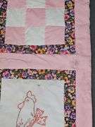 Child's quilt & vintage wooden hanger