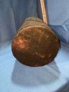 Vintage wood-wrapped metal kerosene or fuel can