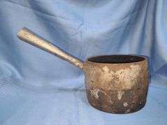 Antique cast iron pot or melting pot