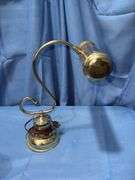 Gold colored desk lamp