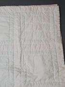 Child's quilt & vintage wooden hanger