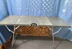 Gray metal folding table